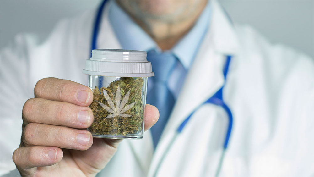 Doctor holding a jar of weed keeping it fresh